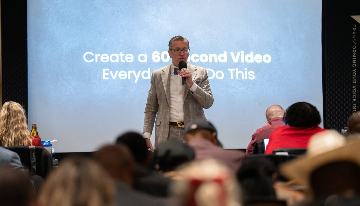 Paul Getter speaking on stage at a Speakpreneur event